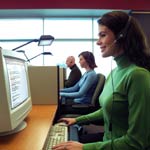Image of a woman at her desk