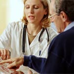 Image of a nurse helping a man