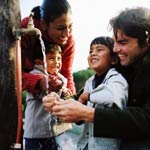 Image of a family washing hands