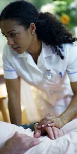 Image of a nurse comforting a patient