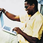 Image of man using his laptop computer