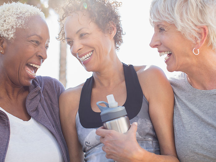 Three women laughing and having a good time