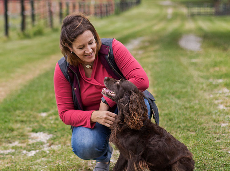 Lynne playing with dog
