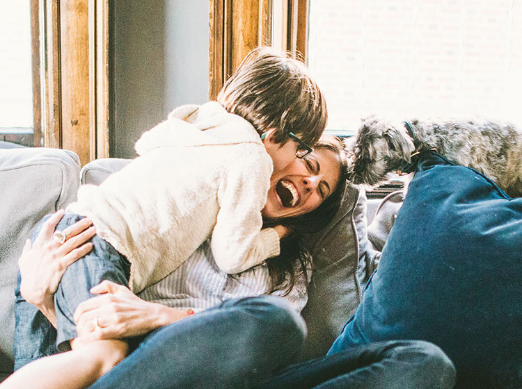 Woman and child laughing