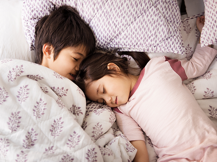 Brother and sister taking a nap