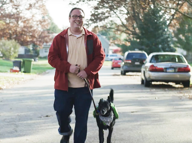 John walking his dog