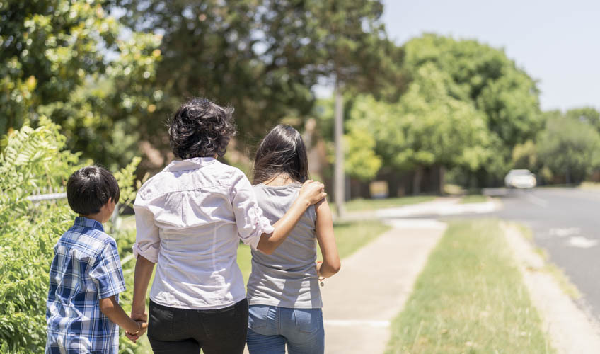 woman walking with children